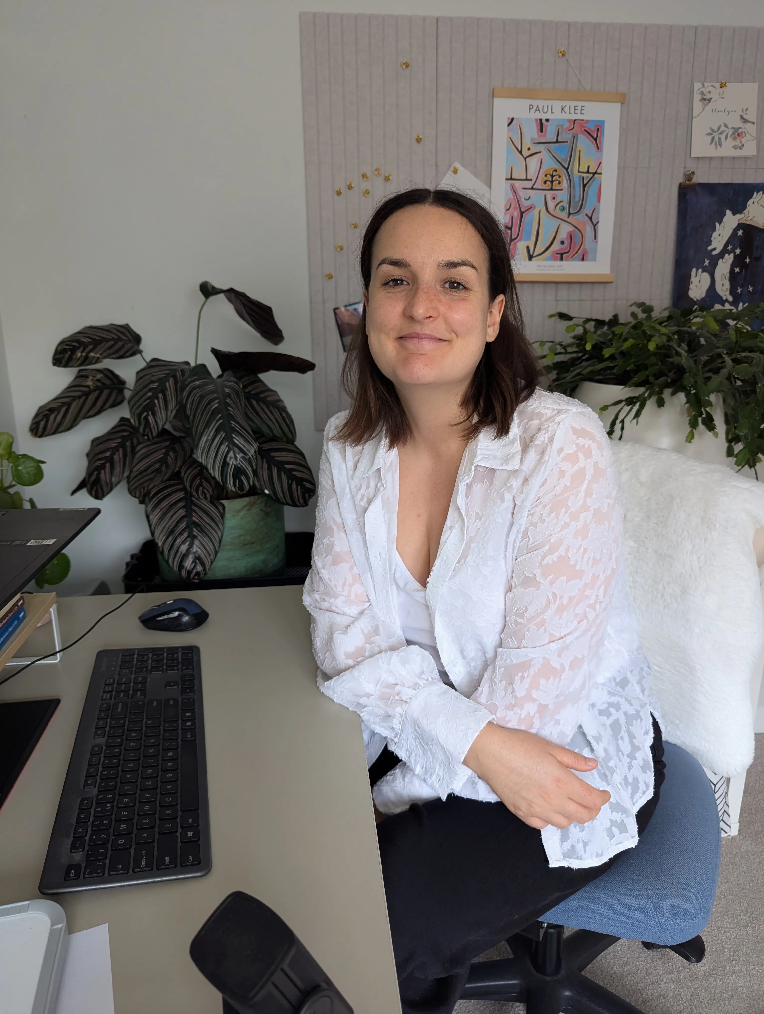 Amy, qualified maths teacher, at her desk